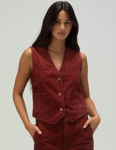 Wrangler Femme Corduroy Vest. Cozy, Cool, And Packed With Texture, Our Femme Corduroy Vest Will Become Your Favorite Fall Look. It Features A Slim Fit That Looks Strong On Its Own Or Layered Over Tees On Cooler Days. This Versatile Statement Piece Is Crafted From 100% Cotton Corduroy, Complete With Two Lower Patch Pockets And Branded Hardware For A Touch Of Wrangler® Authenticity. Slim Fit. Sleeveless. Two Patch Pockets. V-Neck. 100% Cotton. Machine Wash. Imported. Model Is Wearing A Size Small. Model Measurements:height: 5'7" Bust: 32abwaist: 23"hips: 34" Cord Vest Outfit, Overalls Boys, Corduroy Vest, Chino Pants Women, Corduroy Top, Wwe T Shirts, Vest Outfit, Girls Graphic Tee, Girls Blouse