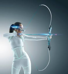 a woman in white is aiming with a bow and arrow at the target on a dark background