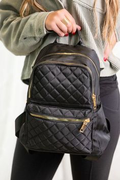 Stay stylish and carefree with our Abby Black Quilted Backpack Bag Tote Purse! Its unique quilted design adds a touch of flair while its versatile functionality as a backpack keeps you on the go. Don't sacrifice cuteness for convenience- enjoy each day with this must-have accessory! Quilted Design Lined Inside 28cm x 14cm x 32cm (top handle 9cm) Quilted On-the-go Standard Backpack, Black Quilted School Bag, Quilted Standard Backpack For Back To School, Back To School Quilted Bags, Quilted Backpack For Daily Use, Quilted Standard Backpack For Daily Use, Back To School Quilted Backpack, Quilted Backpack For Travel And Back To School, Back To School Travel Backpack With Quilted Detail