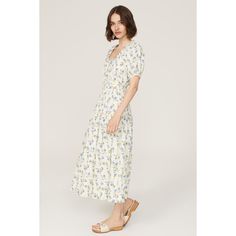 Blue floral cotton (100% Cotton). Hourglass. Short sleeves. Scoop neck. Pull on. 51.5" from shoulder to hemline. Imported. White Ditsy Floral Print Dress, Day Out Cotton Midi Dress With Floral Print, White Ditsy Floral Print Dress For Spring, Cotton Floral Print Midi Dress For Day Out, Cotton Midi Dress With Floral Print For Day Out, Spring Cream Midi Dress With Floral Print, White Ditsy Floral Print Dress With Square Neck, White Ditsy Floral Print Dress For Daywear, White Square Neck Floral Dress