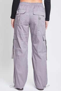 Add style, comfort, and versatility to your pant collection with our women’s elastic waist cargo pants. This relaxed-fit cargo pant is constructed with lightweight cotton fabric for maximum comfort and versatility. Our cargo pants for women have a relaxed leg, baggy fit from hip to hem, and are full-length with a draws Trendy Cotton Cargo Jeans, Utility Cotton Parachute Pants Full Length, Full Length Cotton Cargo Bottoms, Cotton Cargo Parachute Pants With Straight Leg, Cotton Straight Leg Cargo Parachute Pants, Cotton Cargo Style Parachute Pants With Straight Leg, Spring Cotton Cargo Pants With Cargo Pockets, Cotton Straight Leg Parachute Pants, Full Length Cotton Cargo Jeans With Elastic Waistband