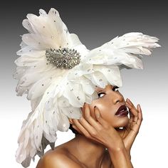 Step Into Winter With Unparalleled Elegance In This Exquisitely Stunning Couture Winter White Feathered Rhinestone Embellished Masterpiece! This Luxurious Hat Is Meticously Hancrafted With Delicate Feathers Adorned With Sparkling Rhinestones, Making It The Perfect Winter Wardrobe Accessory. Whether You're Attending A Glamorous Event Or Enjoying A Chic Day Out, This Hat Will Ensure You Stand Out In Style. Embrace The Season With Class And Sophistication In This "Unique Work Of Art!! Luxury Fascinator For Kentucky Derby, Elegant Fitted Costume Hat With Tall Crown, Elegant Tall Crown Party Hat, Luxury Wedding Headpieces, Luxury Fascinator For Races, Luxury High Crown Hat For Wedding, Luxury High Crown Wedding Hat, Elegant White Hat With Rhinestones, White Rhinestone Party Headpiece