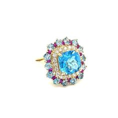 This is part of Chairish’s Fine Jewelry assortment.  This is part of Chairish’s Fine Jewelry assortment.  6.41 Carat Blue Topaz Sapphire Diamond Yellow Gold Cocktail Ring  Beautiful to say the Least!   This Ring has a magnificent Cushion Cut Blue Topaz that weighs 3.93 Carats and is surrounded by 14 Blue Topaz that weigh 1.73 Carats, 14 Pink Sapphires that weigh 0.31 Carats and it is also accented with 20 Round Cut Diamonds that weigh 0.44 Carats (Clarity: SI1, Color: F). The total carat weight Yellow Gold Cocktail Ring, Gold Cocktail Ring, Gold Cocktail, Unique Beauty, Sapphire Diamond, Ring Size 7, Cocktail Ring, Round Cut Diamond, Cushion Cut