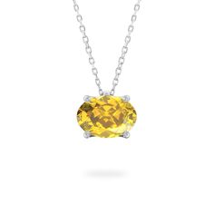 This November birthstone necklace features a stunning Citrine-colored Yellow Sapphire, which is not only brighter and more brilliant than the traditional stone, but is also more durable for daily wear. The result is a classic birthstone look, in heirloom quality. Timeless Yellow Gemstone Jewelry, Classic Citrine Gemstone Jewelry, Classic White Gold Citrine Jewelry, Classic Citrine Jewelry With Gemstone Accents, Classic Gemstone Birthstone Necklace, Classic Necklace With Round Birthstone, Oval Yellow Gold Birthstone Necklace With Gemstone, Classic Birthstone Necklace With Round Gemstone Pendant, Classic Birthstone Necklace With Round Pendant