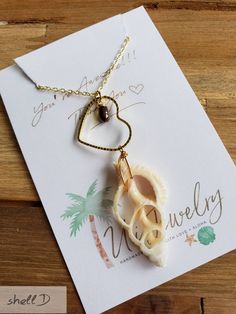 "Beautiful Hawaiian Jewelry, Shell Necklace, Pearl Necklace, Beach Necklace, Seashell Necklace, Hawaii Jewelry, Shell Jewelry, Beach Jewelry, Heart Necklace, Gifts from Hawaii, Handmade on Maui by U'i Jewelry Mouo Necklace (moe oo oh) * Calm place in the sea This natural shell pendant necklace is made to order. It makes a great gift for yourself or for a friend or family member. Handmade just for you with love and aloha on Maui. You can customize these sea shell necklaces to suit your personal s Sea Shell Necklaces, Calm Place, Sea Shell Necklace, Hawaii Jewelry, Peacock Pearl, Beach Necklace, Hawaiian Jewelry, Beach Necklaces, Jewelry Heart