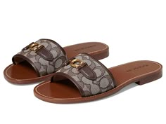 COACH Ina Jacquard Sandal - Women's Shoes : Maple/Oak : Please Note: COACH items cannot be shipped to military addresses (APO or FPO) and addresses in Hawaii, the Virgin Islands, Guam or any other locations outside of the continental US. The COACH Ina Jacquard Sandals feature a wide strap with hardware detailing and easy to wear design. Textile upper. Leather and synthetic lining and insole. Easy slip-on style. Open round toe. Textile and synthetic outsole. Imported. Measurements: Heel Height: 3 Luxury Gucci Slip-on Sandals, Luxury Chic Slip-on Sandals, Luxury Sandals Trendy, Luxury Slip-on Casual Slides, White Gucci Espadrilles For Women, Gucci Casual Luxury Espadrilles, Luxury Chic Gucci Mules, Luxury Summer Slippers, Coach Georgie Sandal