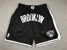 Black Athletic Shorts For Basketball Season, Black Sportswear Bottoms For Basketball, Black Athleisure Bottoms For Basketball, Black Sports Bottoms With Letter Print, Black Sporty Basketball Bottoms, Black Letter Print Sports Bottoms, Sporty Black Bottoms For Basketball, Casual Black Athletic Shorts For Basketball, Black Sporty Athletic Shorts For Basketball