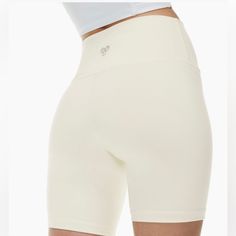 Size Medium New With Tags Tna 7” Shorts In A Creamy White Color Super Buttery Soft White Compression Biker Shorts With Built-in Shorts, White Bottoms With Built-in Shorts, White Sports Shorts With Short Inseam, White Stretch Athletic Shorts, Stretch White Athletic Shorts, White Stretch Athletic Shorts With Short Inseam, White Short Athleisure Bottoms, White Short-length Athleisure Bottoms, White Short Length Athleisure Bottoms