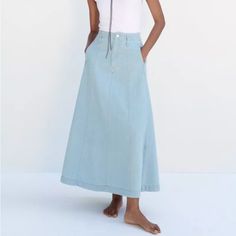 Midi Denim Skirt.Size Small It Has A Stain On The Back Spring Straight-leg Denim Blue Skirt, Blue Denim Skirt For Spring, Denim Skirt Jeans For Spring, High Rise Relaxed Denim Blue Skirt, Wide Leg Light Wash Skirt For Summer, High Waist Washed Blue Denim Skirt, Casual Wide-leg Washed Blue Skirt, Light Wash Long Denim Skirt, Chic Light Wash Denim Skirt With Pockets