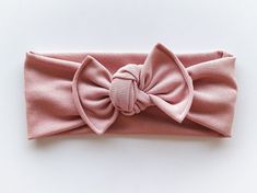 This headband is made from a blended & stretchy fabric. It's designed to be tied & untied to adjust for sizes, but comes pre-tied. >>> Headband Sizes<<>>Cleaning<< Headband Sizes, Daisy Headband, Knotted Baby Headband, Skirts For Girls, Boho Twists, Newborn Bows, Sunflower Daisy, Jeans For Girls, Baby Turban