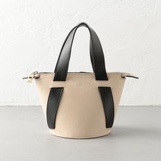 taupe leather bucket bag #color_taupe-black Black Bucket Bag, Colorful Handbags, Small Buckets, Black Bucket, Gunmetal Hardware, Facebook Features, Secret Sale, Daily Essentials, Colorful Boho