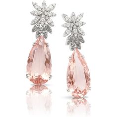 Indulge in the luxurious beauty of these 18k white gold Ghirlanda Atelier Earrings by Pasquale Bruni. The exquisite design features a stunning morganite stone that shimmers with a subtle pink hue, surrounded by brilliant white and grey diamonds. The unique color combination of these gems creates a mesmerizing contrast that will captivate any onlooker. The earrings are masterfully crafted with intricate details, making them an exceptional addition to any fine jewelry collection. These earrings wi Luxury Silver Jewelry With Stone Work, Luxury Fusion Jewelry With Natural Stones, Luxury Elegant Gemstone Earrings, Formal Pear-shaped Platinum Earrings, Luxury Pear-shaped Diamond Earrings With Gemstones, Formal White Gold Pear-shaped Earrings, Formal Pear-shaped White Gold Earrings, Luxury Pear-shaped Earrings For Formal Events, Luxury Pear-shaped Earrings For Formal Occasions