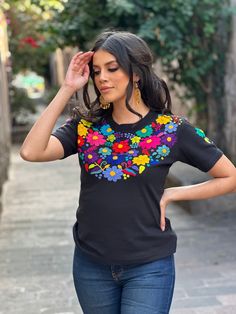 Multicolor Bohemian Relaxed Fit T-shirt, Bohemian Tops With Geometric Embroidery And Crew Neck, Bohemian Crew Neck Top With Geometric Embroidery, Bohemian Embroidered Summer T-shirt, Traditional Embroidered Cotton T-shirt, Multicolor Floral Embroidery T-shirt For Summer, Summer T-shirt With Multicolor Embroidery, Summer T-shirt With Multicolor Embroidery And Short Sleeves, Summer Multicolor Embroidered Short Sleeve T-shirt