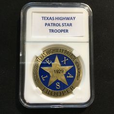 the texas highway patrol medal is on display