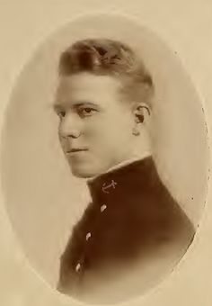 an old black and white photo of a woman in a dress coat with her hair up