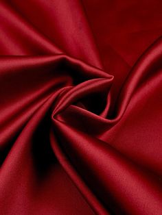 Indulge in the luxurious feel of this 58"/60" wide (147/152 cm) Silk Skin Duchess fabric, also known as Peau de Soie. Its dull satin finish and lightweight drape make it a perfect choice for creating elegant bridesmaid dresses, formal gowns, or any special occasion attire. With a subtle sheen and smooth texture, this high-quality silk fabric offers a sophisticated look and feel. Whether you're a professional dressmaker or an avid sewing enthusiast, this versatile material will elevate your projects with its timeless beauty and exceptional craftsmanship. Elevate your sewing experience and create stunning garments that will turn heads with this premium Silk Skin Duchess fabric. Luxurious Fabric: Crafted from exquisite peau de soie silk, this fabric offers a dull satin finish and a smooth, su Duchess Fabric, Bridesmaid Dresses Formal, Elegant Bridesmaid Dresses, Elegant Drapes, Matte Satin, Red Satin, Dresses Formal, Red Fabric, Smooth Texture