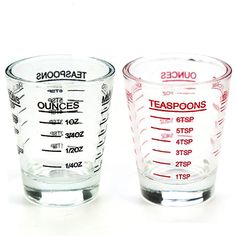 two glass measuring cups sitting next to each other on a white background with 2 packs of coupons