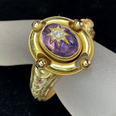 One Turn Of Century Art Deco Heavy 14k Yellow Gold Lady Bracelet, Custom Handmade. On The Bracelet, It Bezel Set One Oval Cabochon Natural Amethyst With A Starburst In The Middle, One Old Euro Cut Diamond Bezel On Top, And Embellished With Eight (8) Small Euro Cut Diamond, Combine Approx. 1.00ct, Being G-H Color And Si1 Clarity. The Amethyst Approxl 22.0 X16.0mm, Weight Approx. 32.0ct. At The Four Side Of The Bezel, It Has One 6.25mm Gold Bead. Mesh Gold Link, Tulip Like Etching Between The Split Mesh Band. Hidden Tab Insert Clasp With 3" Safety Chain. There Are Some Restoration Was Done At Both End Of The Bracelet Near The Clasp, The Grain Etching Are Missing After The Repair. This Antique Antique Bracelets, Amethyst Bracelet, Bezel Diamond, Oval Cabochon, Amethyst Gemstone, Gold Beads, Womens Jewelry Bracelets, Womens Bracelets, Diamond Cuts