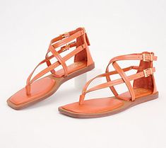 These strappy sandals are sure to show off your fashionista side. From Vince Camuto. Trendy Strapped Sandals For Summer, Summer Strappy T-strap Sandals With Buckle Closure, Toe Post Strap Sandals For Spring, Spring Toe Post Sandals With Strap, Spring Open Toe T-strap Sandals With Strap, Spring T-strap Sandals With Adjustable Toe Post, Spring Toe Post T-strap Sandals With Adjustable Strap, Flat T-strap Sandals With Adjustable Strap For Spring, Trendy Strap Sandals For Vacation