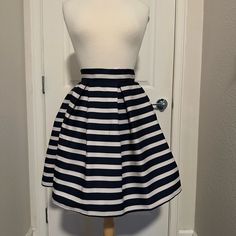 This Skirt Is Stunning! It Sinches At The Waist And Is A Little Poofy. Brand New, Perfect Condition With The Tags. Striped Pleated Knee-length Skirt, Chic Striped Skirt, Summer Navy Flared Skirt, Navy Flared Skirt For Summer, Striped Lined Skirt For Day Out, Chic Full Skirt For Beach, Navy Flared Skirt For Spring, Spring Navy Pleated Mini Skirt, Navy Lined Skirt For Spring