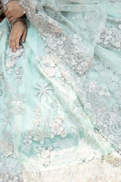 Luxury Embellished Ice Blue Pishwas Frock Pakistani Wedding Dress is a Hand embellishment of kora, Dabka Pearls, and Naqshi masterpiece that will give you your desired magical look on the big day. Perfectly stitched and premium quality fabric make this Pishwas Dress your foremost priority for the wedding. Embroidered Pishwas: The stunning Pishwas Frock Party Dress has a premium Silk fabric. This Pishwas is crafted with Sitara, Dabka, kora, pearls, and Naqshi details all over the kameez that crea Light Blue Semi-stitched Dress With Intricate Embroidery, Semi-stitched Light Blue Dress With Intricate Embroidery, Light Blue Bollywood Dress With Intricate Embroidery, Blue Floral Embroidered Semi-stitched Gown, Blue Floral Embroidered Wedding Gown, Blue Floral Embroidery Wedding Gown, Embellished Anarkali Dress For Ceremony, Light Blue Dress For Wedding And Eid, Light Blue Wedding Dress For Eid