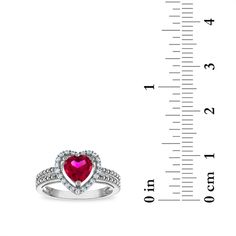 Heart Shape Ruby and White Sapphire Fashion Heart 18" Ring in Rhodium Plated Sterling SilverShow off your fashion sense with our modern collection of fashion jewelry. Fine Jewelry Heart Cut For Valentine's Day, Halo Setting Round Jewelry For Valentine's Day, Diamond Accents Jewelry For Valentine's Day Anniversary, Fine Gemstone Jewelry For Valentine's Day, Valentine's Day Fine Jewelry In White Gold, Valentine's Day White Gold Fine Jewelry, Valentine's Day Fine White Gold Jewelry, Sterling Silver Jewelry With Prong Setting For Valentine's Day, Anniversary Jewelry With Heart Cut Halo Design