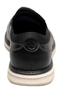 Clean topstitching lends handsome style to this sleek slip-on fitted with a cushioned footbed and shaped by a classic moc toe. Synthetic upper and lining/rubber sole Imported Black Moc Toe Slip-ons With Cushioned Footbed, Classic Black Slip-ons With Arch Support, Casual Black Slip-ons For Business Casual, Casual Moc Toe Slip-resistant Loafers, Casual Slip-resistant Moc Toe Loafers, Comfortable Black Business Slip-ons, Black Moc Toe Slip-ons With Stitched Sole, Black Slip-ons With Cushioned Footbed And Moc Toe, Handsome Style