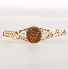 Vintage 1950's 14k Yellow Gold 1853 Liberty Head 5$ Coin Hinged Bangle BraceletMetal Information: 14k Yellow Gold / Coin Is 90% GoldTotal Weight: 18.4gBracelet Width: 18.8mmBracelet Length: 7.5"Circa: 1950'sEstimated Retail Price: $3475.00OUR PRICE: $2780.0044654 Collectible Yellow Gold Bangle Bracelet, Heirloom 14k Yellow Gold Cuff Bracelet, Collectible Yellow Gold Bracelet, Collectible Gold Jubilee Bracelet, Yellow Gold Estate Jewelry, Yellow Gold Bangle Bracelet, Vintage 14k Stamped Gold Bangle Bracelet, Vintage 14k Gold Hallmarked Bangle, Gold Estate Jewelry Stamped 14k