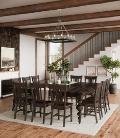 a dining room table with chairs and a chandelier