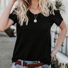 Our V-Neck Tee Is Back In Our Favorite Cotton/ Modal Blend! So Breathable And Easy To Wear! We Even Like To Style Our Citizen Cotton V-Neck Tee In An Oversized Fit So You Can Tuck It In The Front! This Tee Is Also Perfect For Layering For Spring! Bust Measurements Xs 17" // S 18" // M 19" // L 20" 50% Modal And 50% Cotton Model Is 5’7” And Wears A Small Also Available In White And Charcoal. Everyday Black Short Sleeve Top For Spring, Black Short Sleeve Top For Everyday Spring Wear, Black V-neck Short Sleeve Top, Black V-neck T-shirt For Everyday, Black V-neck Short Sleeve Top For Spring, Trendy Black V-neck T-shirt, Simple Black Everyday Top, V Neck Tee, Layering