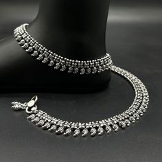 Name of product:  925 Sterling Silver Light Weight Anklet / Silver Payal Weight: 66.50 grams. Length: 26.5centimeter  Stamped: 925 FREE EXPRESS SHIPPING -----Feedback::- A satisfied customer is our top priority and your feedback forms the backbone of our success. Don't forget to give positive feedback along with good ratings. Thank You Silver Anklets With Latkans For Wedding, Silver Wedding Anklets With Latkans, Silver Anklets With Latkans As A Gift, Elegant Adjustable Anklets For Festivals, Festive Silver Sterling Silver Anklets, Silver Bracelet With Latkans In Metal, Silver Anklets For Festivals, Silver Metal Bracelets With Latkans, Oxidized Metal Anklets