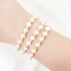 Stretchy Bracelet Freshwater Pearls + Gold Filled Beads Pearl Bracelet With 8mm Beads, Pearl Bracelet With Spacer Beads, Pearl White Bracelets With 8mm Pearl Beads, Pearl Stretch Bracelet With Spacer Beads As Gift, Pearl Beaded Bracelets With 8mm Beads, White Pearl Beaded Bracelets With 8mm Beads, Adjustable Beaded Stretch Bracelet In Pearl White, White Pearl Beaded Charm Bracelet, White Beaded Pearl Charm Bracelet