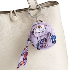 Add a touch of flair to your bag or backpack with our Original Backpack Bag Charm. Designed to elevate your accessory game, this stylish charm features a tiny backpack that adds a playful touch to any bag, making it the perfect accessory to express your unique sense of style. Vera Bradley Original Backpack Bag Charm in Wing in Flight Purple/Blue Trendy Travel Bag Charm Keychain, White Bag With Keychain For Everyday Use, White Travel Bag With Keychain, White Travel Bags With Keychain, Cute Adjustable Travel Bags, Cute Adjustable Bags For Travel, Tiny Backpack, Tech Accessories Gadgets, Dune Jewelry