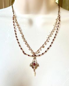 I made this Handmade antique Victorian pendant with ruby and pearl and gold Rosary chain necklace. It measures 18", but also has a generous extender. Ruby And Pearl, Rosary Chain Necklace, Gold Rosary, Victorian Pendants, Rosary Chain, Antique Victorian, Rosary, Necklace Etsy, Ruby