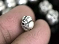 Thai Karen hill tribe Silver garlic shape puffy beads Weight : 4.8 grams Size : 8.5 x 8.5 mm. Lot of : 4 beads Material : 97% silver content Item# KD-015 Donut Shape, Hill Tribe Silver, Beaded Material, Precious Metals, Class Ring, Garlic, Thailand, Rings For Men, Beads