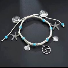 Enhance Your Beach Vibes With This Charming Ankle Jewelry. The Braided Chain Features Delicate Stainless Steel Charms Shaped Like Starfish And Shells, Bringing A Touch Of The Ocean To Your Style. The White And Turquoise Blue Color Combination Adds A Refreshing Pop Of Color To Any Outfit, Making It Perfect For Occasions Like Weddings, Anniversaries, Valentine's Day, Christmas, Or Simply For Everyday Wear. This Anklet Has A Slide-On Closure For Easy Wearing And Is Made Of Acrylic And Stainless Ste Silver Adjustable Anklets For The Beach, Adjustable Silver Anklets For Beach, Starfish Charm Anklets For Beach Vacation, Vacation Anklets With Starfish Charm For Beach Season, Vacation Beach Season Anklets With Starfish Charm, Silver Adjustable Anklets For Vacation, White Beach Anklets With Starfish Charm, Adjustable Silver Anklets For Vacation, White Starfish Charm Anklet For Beach