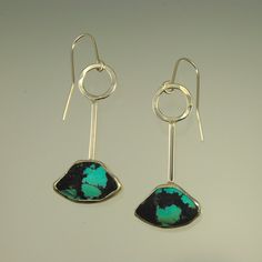 These turquoise drop earrings feature triangular cut stone of Chinese turquoise with dramatic markings set in sterling silver. A bold modern design with a mid century vibe. Modern Turquoise Nickel-free Earrings, Modern Turquoise Dangle Jewelry, Modern Turquoise Dangle Earrings, Modern Round Turquoise Jewelry, Modern Turquoise Round Jewelry, Contemporary Pierced Teardrop Jewelry, Modern Turquoise Sterling Silver Jewelry, Contemporary Jewelry With Teardrop Ear Wire, Contemporary Teardrop Ear Wire Jewelry