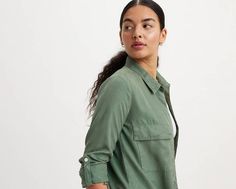 Inspired by classic workwear, our Doreen Utility Shirt features a timeless button-up front, two oversized patch pockets and versatile long sleeves that you can wear rolled up or down. A utilitarian-inspired shirt Cut with a standard fit With a button-up front Features two oversized patch pockets With adjustable long sleeves Fall Shirt With Roll-up Sleeves And Spread Collar, Fall Button-up Tops With Side Pockets, Button-up Shacket With Welt Pockets For Work, Long Sleeve Shirt With Welt Pockets For Work, Khaki Long Sleeve Shirt With Patch Pockets, Utility Workwear Tops With Side Pockets, Workwear Collared Shacket With Side Pockets, Green Workwear Shacket With Button Closure, Khaki Shirt With Patch Pockets For Work