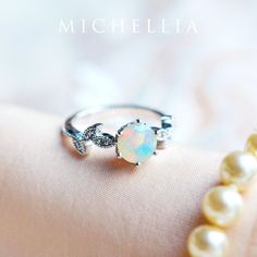 "Our current turnaround time for regular orders is 6-8 weeks. For urgent orders, please shop our Ready-to-Ship collection below (7-10 business days): https://michellia.com/collections/ready-to-ship (please copy and paste into browser) -------- 「Dahlia」- Petite Floral Ring, in Opal In the Victorian language of flowers, \"Dahlia\" denotes elegance and dignity. Enchanted with petals that fell upon the fairies and sun glitters that danced amongst the leaves, our petite floral collection is as magica Exquisite Opal Ring Gift, Exquisite Opal Ring For Gift, Luxury Opal Ring With Accent Stones For Gift, Luxury White Gold Opal Ring As Gift, Luxury White Gold Opal Ring Gift, Silver Opal Ring In 14k Gold For Formal Occasions, Formal Silver Opal Ring In 14k Gold, Diamond Opal Ring Gift, Elegant Rose Gold Opal Ring In Sterling Silver