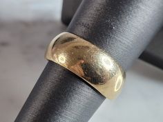 "A WOMENS VINTAGE ESTATE 14K YELLOW GOLD WEDDING BAND RING.     THE SIZE OF THE RING IS A 7.0, AND WEIGHS 6.0g AND IS 5/16\" WIDE.  RING IS MARKED ON THE INSIDE \"14K\".  ANY  QUESTIONS PLEASE DO NOT HESITATE TO ASK.  BE SURE TO CHECK OUT SOME OF MY OTHER GREAT ITEMS UP FOR SALE. THANK YOU IF THERE ARE ANY ISSUES PLEASE CONTACT US, WE'RE ALWAYS HAPPY TO TRY TO HELP YOU OUT AS BEST AS WE CAN." Formal 14k Stamped Wide Band Ring, Classic Oval Wide Band Ring For Wedding, Gold Heirloom Bands Stamped 14k, Vintage Yellow Gold Dome Ring For Wedding, Heirloom Style Wide Band Formal Ring, Vintage Gold Dome Ring With Round Band, Gold Vintage Dome Ring With Round Band, Classic Yellow Gold Wide Band Ring Stamped 14k, 14k Gold Wide Band Ring For Wedding