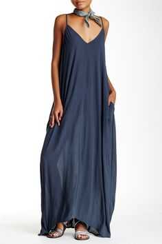 Whether you are hanging out at the pool or beach, this relaxed fitting gauze maxi dress is light enough to keep you cool on the warmest day.Fit: this style runs large, order one size down. V-neck. Adjustable spaghetti straps. V-back. 2 side seam pockets. Solid color. Crinkled woven construction. Approx. 58" length (size S-M). Imported V-neck Unlined Maxi Dress For Beach, Breezy V-neck Maxi Dress For Beach Season, Flowy V-neck Breezy Maxi Dress, Unlined V-neck Maxi Dress For Beach, V-neck Maxi Dress For Beach Season Loungewear, Breezy V-neck Beach Dress For Daywear, Relaxed Fit V-neck Maxi Dress For Summer, Flowy Daywear Maxi Dress, Flowy Unlined Maxi Dress For Daywear