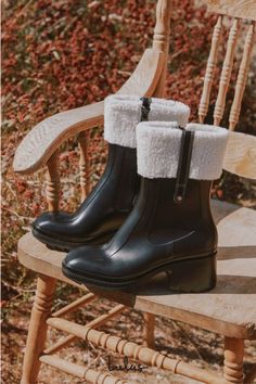 Add a dose of cozy to those chilly, cold weather days with the Lulus Chayy Black Faux Fur Mid-Calf Boots! These rubber boots feature a square toe upper and a mid-calf shaft with a 7.25"" zipper at the instep, all atop a block heel. Fuzzy faux fur trim and a unique stitched detail complete the look. 2. 5"rubber block heel. Cushioned insole. Rubber sole has nonskid markings. All Man Made Materials. Imported. Lulus | Chayy Black Faux Fur Mid-Calf High Heel Boots. Winter Mid-calf Boots With Zipper Closure, Winter Boots With Zipper Closure And Square Toe, Trendy Weatherproof Winter Boots, Trendy Waterproof Boots For Winter, Window Shopping, Rubber Boots, Black Faux Fur, Calf Boots, Heel Boots