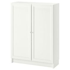 a white cabinet with two doors on the side