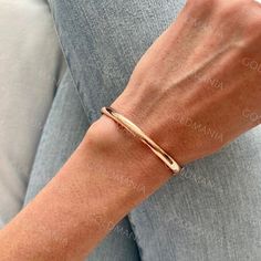 "All Our Bracelets Are Made Of REAL 14K GOLD  14K Rose Gold Bangle Bracelet, 5mm Thick, 7\" Inch, Real 14K Gold Bracelet, Stackable Bangle, Polished Gold Bangle, Women  Shop our 14K Bracelets https://www.etsy.com/shop/GOLDMANIA?ref=seller-platform-mcnav§ion_id=26925987  Shop On Sale items https://www.etsy.com/shop/GOLDMANIA?ref=seller-platform-mcnav§ion_id=1  Metal: 14K Rose Gold, 14K Yellow Gold, 14K White Gold Width: 5 mm Length: 7\" (4.6 Gram), 8\" (5.3 Gram) Closure: Box  SHIPPED FROM NEW YO Formal Rose Gold Round Cuff Bracelet, Adjustable Polished Rose Gold Bangle, Adjustable Rose Gold Bangle With Polished Finish, Rose Gold Stackable Bangle Bracelet, 14k Gold Rose Gold Bangle Fine Jewelry, Rose Gold 14k Fine Jewelry Bangle, Minimalist Polished Rose Gold Bracelet, Minimalist Rose Gold Bracelet With Polished Finish, Fine Jewelry Rose Gold Cuff Bracelet For Anniversary