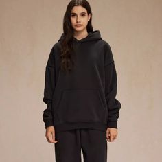 Get ready to snuggle up in style with this Solid Color No Drawstring Hoodie. No more fussing with pesky drawstrings, just pure comfort and simplicity. Perfect for a cozy night in or a casual day out. Stay comfy, stay trendy. Features: -100%Cotton -Crew Neckline -Dropped Shoulder -Graphic -Regular fit -Unisex style Cozy Night, Drawstring Hoodie, Unisex Style, White Hoodie, Night In, Unisex Fashion, No More, Crew Neckline, In Style