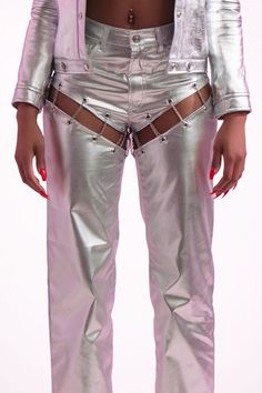 Ariana Cut Out Pants Key Features: Silver grommets Looped chains Chrome accents Breathable, smooth fabric Cutout detailing 5-pocket design Zip fly with button closure Made in the USA Details: The Ariana Cut Out Pants feature striking silver grommets and looped chains that enhance their edgy design. Crafted from breathable and smooth fabric, they ensure comfort and a polished look. With cutouts for added flair and utility pockets for convenience, these pants blend style with functionality. Conten Luxury Party Bottoms With Belt Loops, Painted Pants, Edgy Design, Utility Pockets, Denim Outerwear, Fly Girl, Girl Blog, Turks And Caicos Islands, Easy Wear