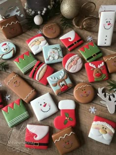 decorated christmas cookies on a wooden table