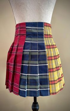 A high-waited miniskirt featuring THREE different tartan plaid patterns. Side zipper closure.  US Size S/4  ( 28" waist) Plaid Skort For School, Fitted Plaid Skort For School, School Fitted Plaid Mini Skirt, Fitted Plaid Mini Skirt In Preppy Style, Fitted Plaid Tennis Skirt For School, Preppy Plaid Mini Skirt For School, Plaid Mini Skirt For School, Plaid Lined Mini Skirt For School, Fitted Multicolor Mini Skirt For School