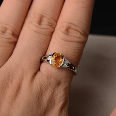 This is a gorgeous handmade creation. Its beauty is its simplicity & Elegance. The 6*8mm oval shape faceted natural citrine is crafted in solid sterling silver and with rhodium plated. All item is sent in a beautiful gift box If you have any idea of design your ring,pls contact me directly. You can realize more lovely stuff clicking the link https://www.etsy.com/shop/knightjewelry?refshopsection_shophome_leftnav Please leave the correct address and you phone number for delivering successfull Oval Yellow Sapphire Birthstone Jewelry, Yellow Sapphire Oval Birthstone Jewelry, Oval Citrine Birthstone Ring, Oval Yellow Citrine Birthstone Ring, Oval Citrine Birthstone Jewelry, Yellow Sapphire Oval Promise Ring, Oval Yellow Sapphire Promise Ring, White Gold Citrine Birthstone Ring With Gemstone, Yellow Oval Birthstone Promise Ring