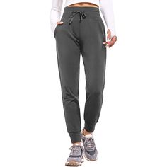 Stay warm and protected from the elements with our Women's Fleece Lined Pants. These water-resistant thermal joggers are perfect for winter running, hiking, and even just lounging around at home. The fleece lining will keep you cozy and comfortable, while the water-resistant material will keep you dry in light rain or snow. The pockets are perfect for storing your phone, keys, or other essentials while you're on the go. These sweatpants are perfect for any outdoor activity and are sure to become Sporty Solid Cargo Pants For Winter, Sporty Cargo Pants For Winter, Winter Joggers With Side Pockets, Winter Jogging Activewear Pants, Sporty Sweatpants For Outdoor Fall Activities, Sporty Outdoor Sweatpants For Fall, Winter Full Length Joggers, Comfortable Moisture-wicking Outdoor Bottoms, Comfortable Outdoor Bottoms With Moisture-wicking